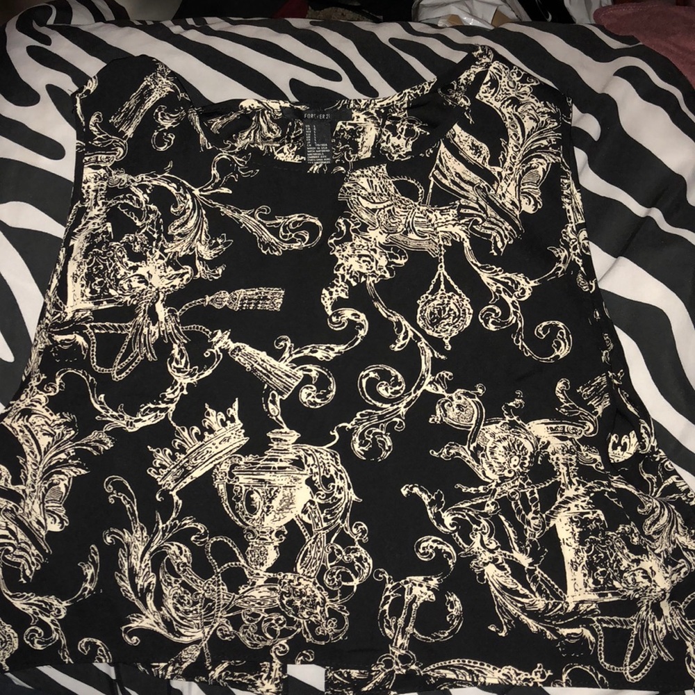 Patterned black crop top with open back